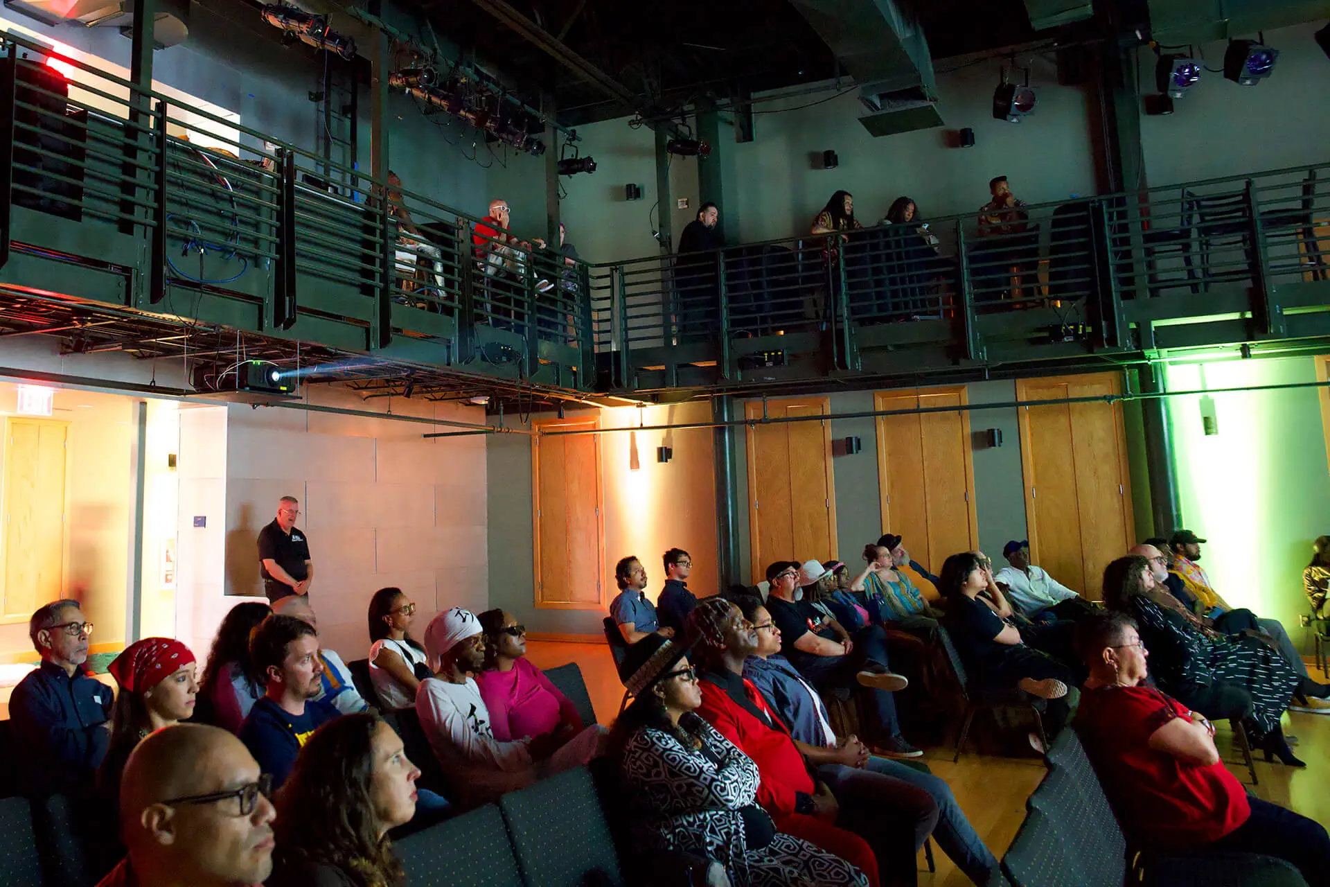 Audience watching a short film at The Sacred Underground Film Festival 2024