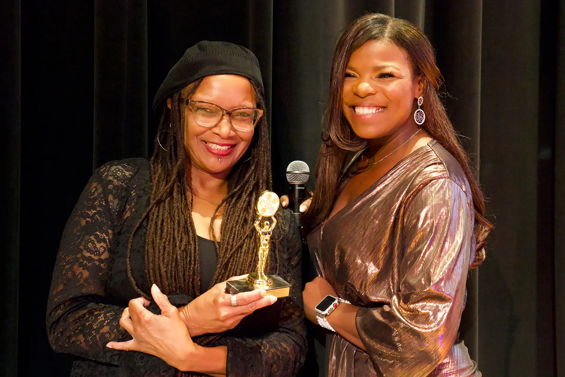 Precina Fowler presenting an award at The Sacred Underground Film Festival 2024