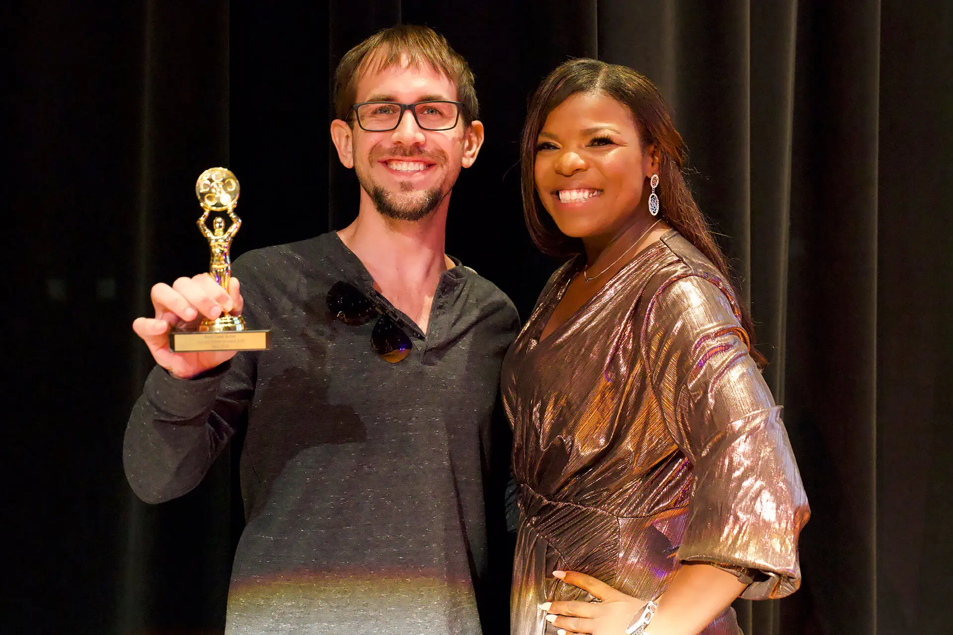 Precina Fowler presenting an award at The Sacred Underground Film Festival 2024